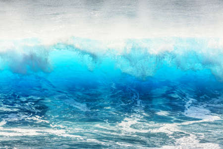 Beautiful seascape view of the big blue surf waves of the Atlantic ocean on the island Madeira, a popular surfing tourist destinationの写真素材