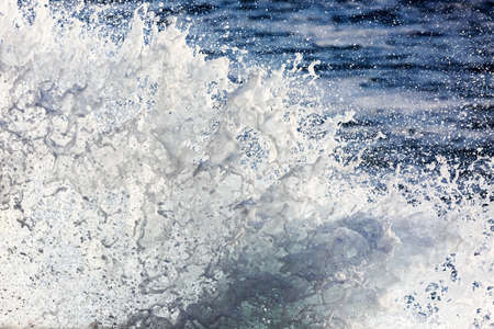 Waves of the Atlantic ocean crashing on the island Madeira, a popular surfing tourist destinationの写真素材