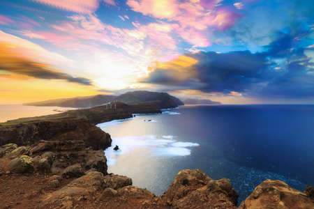 Beautiful stacked long exposure landscape view of the island Madeira at Ponta de Sao Lourenco nature reserve at sunsetの写真素材
