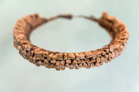 Human teeth necklace (kalung, vuasagale) from West Kalimantan on the island of Borneo, Indonesiaの写真素材