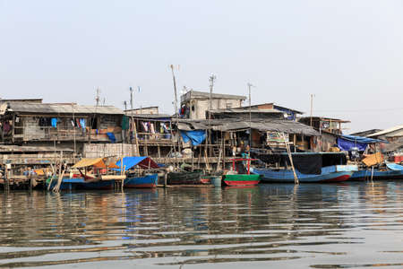 house, tourist, trip, tour, destination, travel, sunda, village, fishing, old, dirty, poor, water, boat, home, culture, indonesian, indonesia, jakarta, kelapa, harbor, life, garbage, local, environment, lifestyle, hut, structure, waterfront, shack, area, people, poverty, homes, outdoor, urban, city, town, asian, coast, building, vessel, architecture, traditional landscape, asia, vacation, ship, tourismの写真素材
