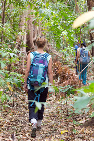 Beautiful female tourist in the Tangkoko nature reserve on the Indonesian island of Sulawesi, on a ecotourism jungle hikeの写真素材