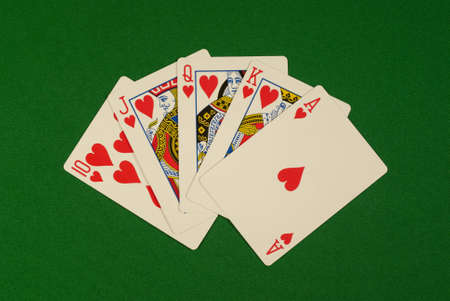poker, royal flush, heart cards on green cloth, feltのeditorial素材