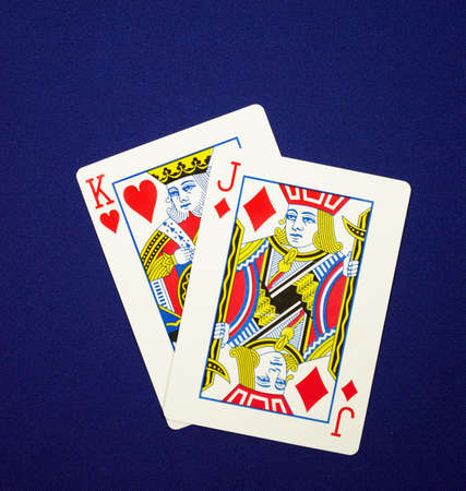playing cards king jack (in poker that hand names King James) on blue clothのeditorial素材