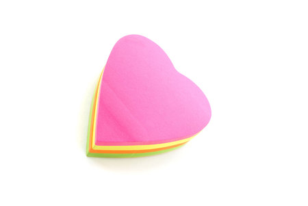 sticky notes in the form of heart isolated over white