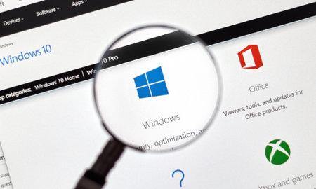 MONTREAL, CANADA - FEBRUARY, 2016 - Microsoft Windows on the web under magnifying glass.