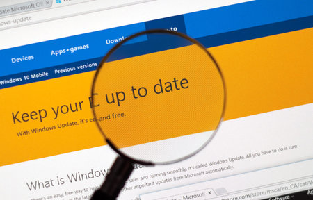 MONTREAL, CANADA - FEBRUARY, 2016 - Microsoft Update on the web under magnifying glass.