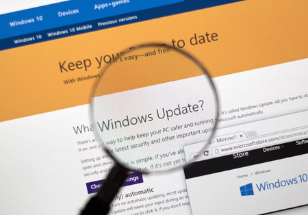 MONTREAL, CANADA - FEBRUARY, 2016 - Microsoft Update on the web under magnifying glass.