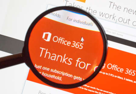 MONTREAL, CANADA - FEBRUARY, 2016 - Microsoft Office 365 on the web under magnifying glass.のeditorial素材