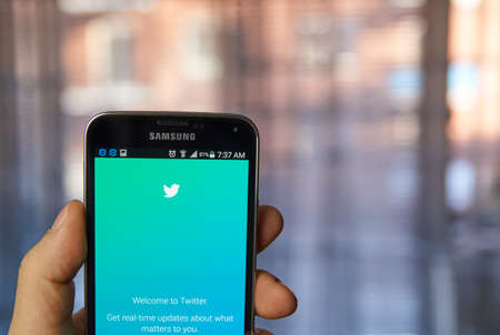 MONTREAL, CANADA - MARCH 4, 2016 -  Twitter application on Samsung S5 screen. Twitter is a well known free social networking microblogging service.のeditorial素材