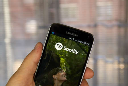 MONTREAL, CANADA - MARCH 20, 2016 - Spotify mobile application on Samsung S5's screen. Spotify is a digital music serviceのeditorial素材
