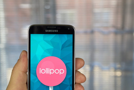 MONTREAL, CANADA - MARCH 20, 2016 - Android lollipop OS logo on smartphone.  Android Lollipop is a...