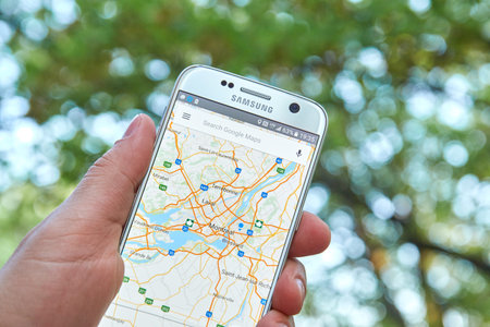 MONTREAL, CANADA - MAY 23, 2016 : Google Maps application on Samsung S7 screen. The Google Maps app...