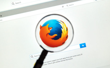 MONTREAL, CANADA - JUNE 4, 2016 : Firefox web browser under magnifying glass. Firefox is a free and...