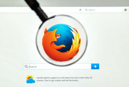 MONTREAL, CANADA - JUNE 4, 2016 : Firefox web browser under magnifying glass. Firefox is a free and open-source web browser developed by the Mozilla Foundation.のeditorial素材