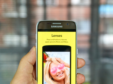 MONTREAL, CANADA - JULY 1, 2016 - Snapchat lenses on android cell smartphone. Snapchat is a mobile messaging application used to share photos, videos, text, and drawings.のeditorial素材