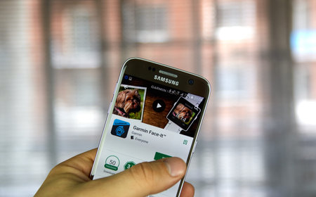 MONTREAL, CANADA - MARCH 10, 2017 : Garmin Face It app on Samsung s7 screen. Garmin is an American...