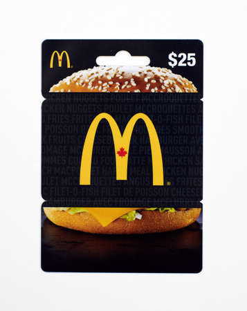 MONTREAL, CANADA - JULY 30, 2017 : Mcdonalds 25 dollar gift card on a white backgroundのeditorial素材