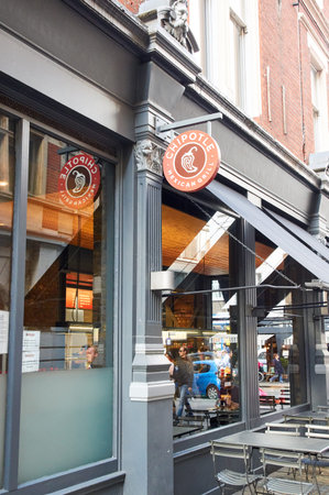 LONDON, ENGLAND - MAY 13, 2017 : Chipotle Mexican Grill signage and storefront. The company is an...
