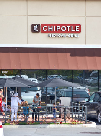 PLATTSBURGH, USA - AUGUST 23, 2017 : Chipotle restaurant and logo. Chipotle Mexican Grill, Inc is an American chain of fast casual restaurants in the United Statesのeditorial素材