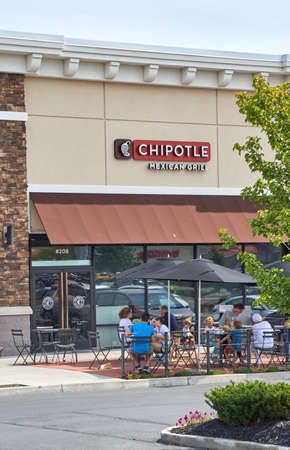 PLATTSBURGH, USA - AUGUST 23, 2017 : Chipotle restaurant and logo. Chipotle Mexican Grill, Inc is an American chain of fast casual restaurants in the United Statesのeditorial素材
