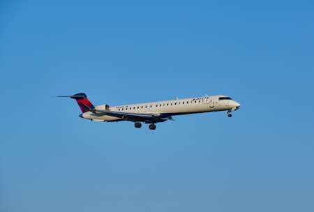 MONTREAL, CANADA - AUGUST 28, 2017 : Landing Delta Connection Bombardier INC CL-600 airplane. Delta Connection is a regional airline brand name for Delta Air Linesのeditorial素材