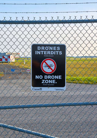 MONTREAL, CANADA - AUGUST 28, 2017 : No drones zone sign close to Montreal YUL airport.のeditorial素材