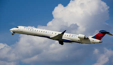 MONTREAL, CANADA - AUGUST 28, 2017 : Delta Connection taking off Bombardier CL-600 airplane. Delta Connection is a regional airline brand name for Delta Air Linesのeditorial素材