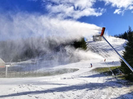 Snow making in the beginning of ski season at Sommets Saint-Sauveur, Quebec, Canadaの写真素材