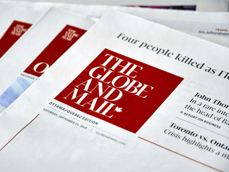 MONTREAL, CANADA - SEPTEMBER 18, 2018: The Globe and Mail newspaper. The Globe and Mail is a Canadian newspaper printed in five cities in western and central Canada.のeditorial素材