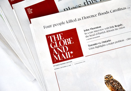 MONTREAL, CANADA - SEPTEMBER 18, 2018: The Globe and Mail newspaper. The Globe and Mail is a Canadian newspaper printed in five cities in western and central Canada.のeditorial素材