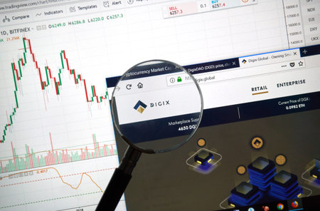 MONTREAL, CANADA - SEPTEMBER 8, 2018: Digix altcoin site under magnifying glass. Blockchain is a...