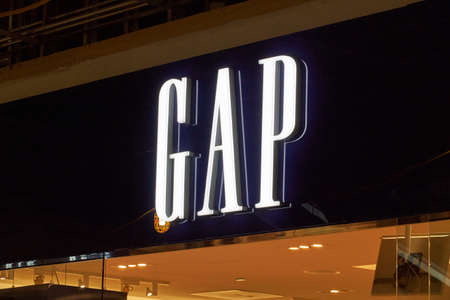 MONTREAL, CANADA - OCTOBER 4, 2018: Gap storefront and logo. Gap is a popular American worldwide clothing and accessories retailer.のeditorial素材