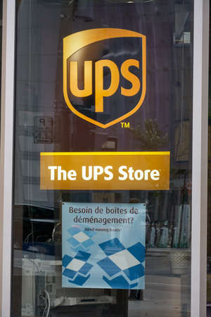 MONTREAL, CANADA - OCTOBER 4, 2018: UPS postal office entrance in Montreal. United Parcel Service is an American package delivery and supply chain management company.のeditorial素材