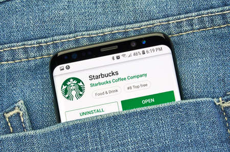 MONTREAL, CANADA - December 23, 2018: Starbucks android app and logo on Samsung s8 screen. Starbucks Corporation is an American coffee company and coffeehouse chain.のeditorial素材