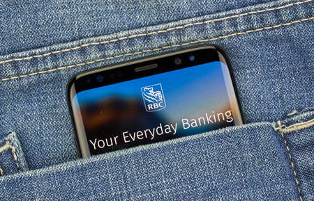 MONTREAL, CANADA - December 23, 2018: RBC android app on Samsung s8 screen. RBC Royal Bank is the leading provider of financial services and support to Canada's Knowledge-Based Industriesのeditorial素材
