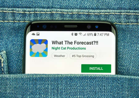 MONTREAL, CANADA - December 23, 2018: What the forecast. Wheather forecast android app on Samsung s8 screen.のeditorial素材