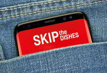 MONTREAL, CANADA - December 23, 2018: Skip the Dishes android app on Samsung s8 screen....