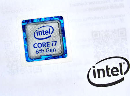 MONTREAL, CANADA - DECEMBER 8, 2018: Intel label logo of i7 8th generation CPU and printed on manual. Intel is an American multinational corporation and technology company headquartered in Californiaのeditorial素材