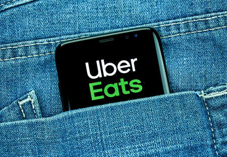 MONTREAL, CANADA - December 23, 2018: Ubear eats android app on Samsung s8 screen. Uber Eats is a American online food ordering and delivery platform launched and operated by Uberのeditorial素材