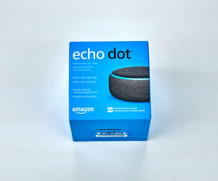 MONTREAL, CANADA - DECEMBER 17, 2018: Amazon Echo and Echo Dot with box over white background. Amazon Echo and Echo Dot are a brand of smart speakers developed by Amazon.のeditorial素材