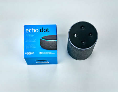 MONTREAL, CANADA - DECEMBER 17, 2018: Amazon Echo and Echo Dot with box over white background. Amazon Echo and Echo Dot are a brand of smart speakers developed by Amazon.のeditorial素材