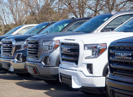 Montreal, Canada - April 4, 2020: GMC new 2020 trucks in a line at dealership. GMC General Motors Company is a division of the American automobile manufacturer General Motors GMのeditorial素材