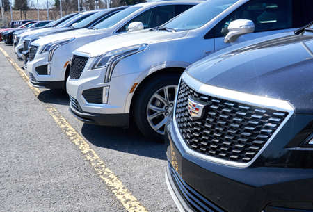 Montreal, Canada - April 4, 2020: Cadillac XT4 cars at dealership. Cadillac is a division of American automobile manufacturer General Motors GM that designs and builds luxury vehicles.のeditorial素材