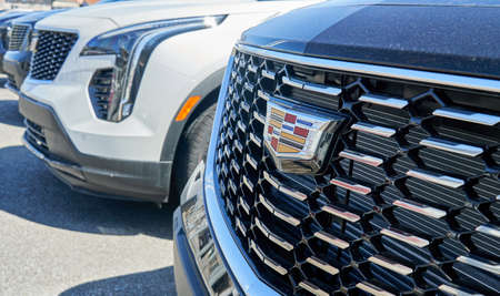 Montreal, Canada - April 4, 2020: Cadillac XT5 black car at dealership. Cadillac is a division of American automobile manufacturer General Motors GM that designs and builds luxury vehicles.のeditorial素材