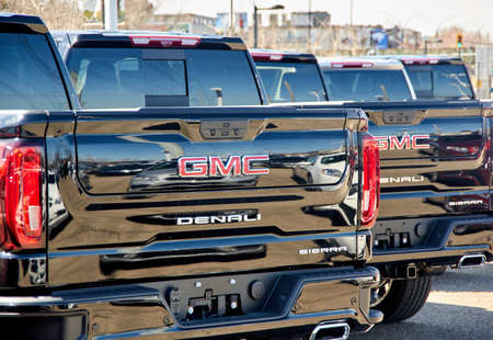Montreal, Canada - April 4, 2020: GMC new 2020 trucks in a line at dealership. GMC General Motors Company is a division of the American automobile manufacturer General Motors GMのeditorial素材