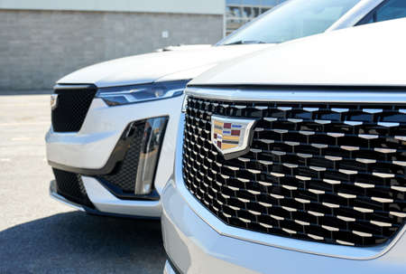Montreal, Canada - April 4, 2020: Cadillac XT4 cars at dealership. Cadillac is a division of American automobile manufacturer General Motors GM that designs and builds luxury vehicles.のeditorial素材