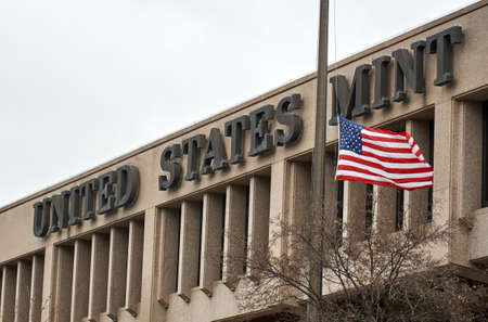 United States Mint building and flag. The United States Mint is a bureau of the Department of the Treasury responsible for producing coinage for the United Statesの写真素材