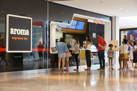Toronto, Canada - August 26, 2019: People at Aroma Espresso Bar. Aroma Espresso Bar is an Israeli...