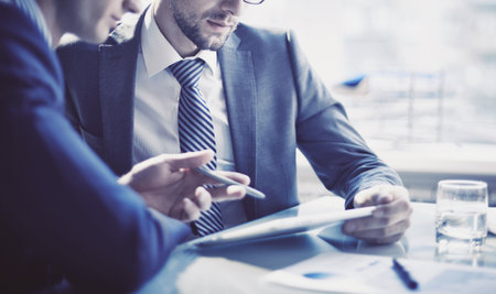 Businessmen working together in office.の写真素材